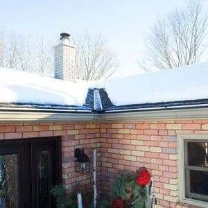 EDGE-CUTTER channel flashings de-icing roof in Winter
